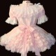 A girl's gown is shown in the image, and it is very pretty in light pink.