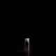 In this photograph, a Darkness can be seen, and a single boy is standing.