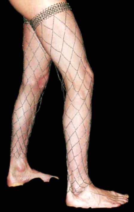 A girl is dressed in black and white Fishnet Stockings Sparkle.
