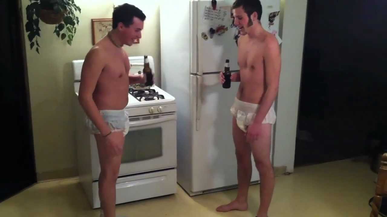 The Abdl Twins are standing for the photoshoot in the image.