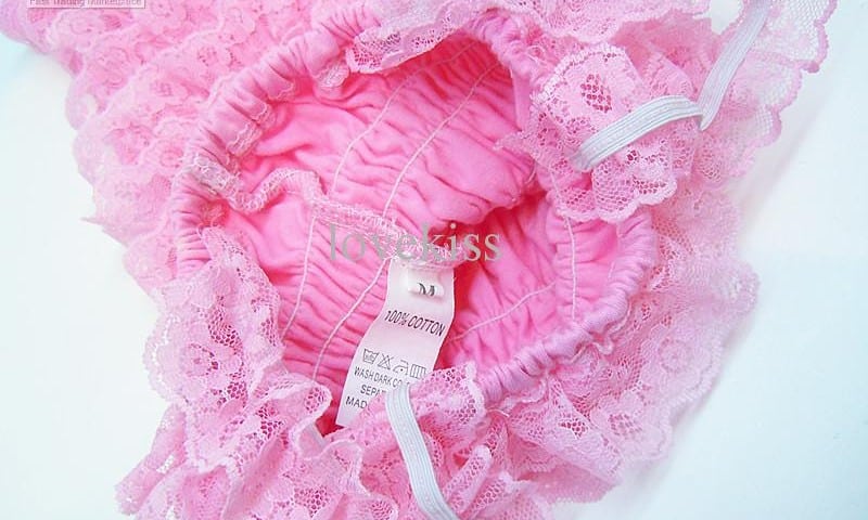 A pink skirt with frills that was maintained on the floor was quite attractive to both see and wear.