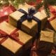 There were numerous Christmas presents on the ground for the people.