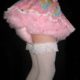 A Diaper Sissy: The lady was dressed as a diaper sissy in a diaper sissy dress with white stocks.