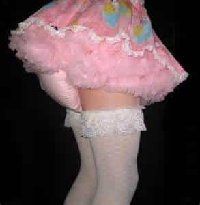 A Diaper Sissy: The lady was dressed as a diaper sissy in a diaper sissy dress with white stocks.