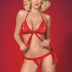 A hot woman in a red bikini waiting to be shot