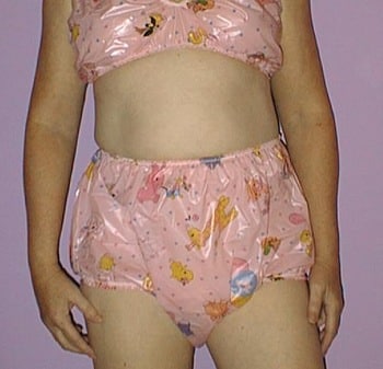 Adults love Elastic Printed Diapers. In the photo, he is wearing a Pink Elastic Printed Adult Diaper.