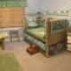 There was an adult nursery room, a bedroom with a bed, and literature in the room.